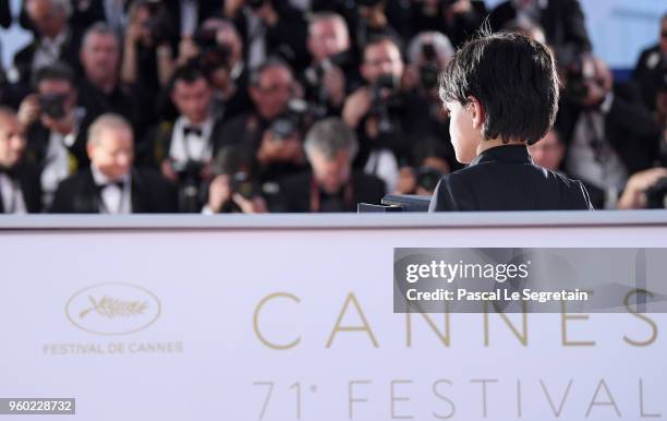 Actor Zain Alrafeea poses with Director Nadine Labaki's Jury Prize award for 'Capharnaum' at the photocall the Palme D'Or Winner during the 71st...