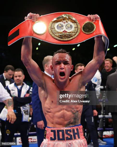 Josh Warrington celebrates victory over Lee Selby in the IBF Featherweight Championship fight at Elland Road on May 19, 2018 in Leeds, England.