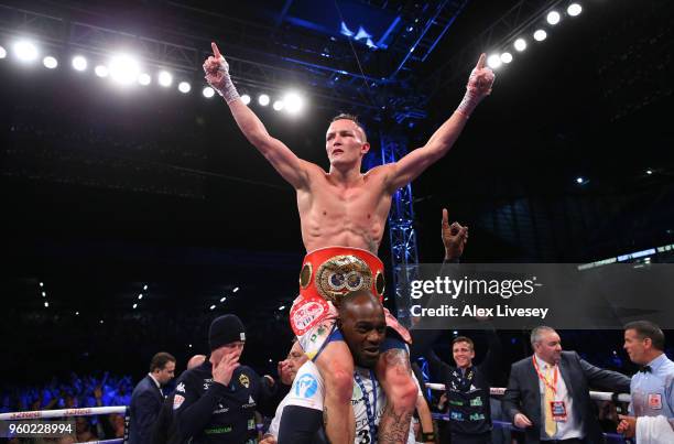 Josh Warrington celebrates victory over Lee Selby in the IBF Featherweight Championship fight at Elland Road on May 19, 2018 in Leeds, England.