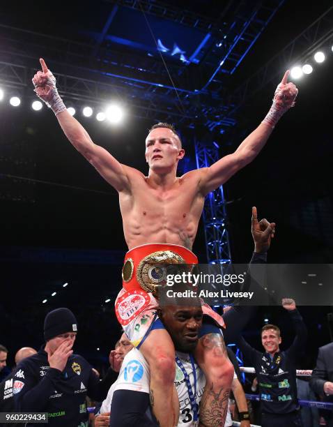 Josh Warrington celebrates victory over Lee Selby in the IBF Featherweight Championship fight at Elland Road on May 19, 2018 in Leeds, England.