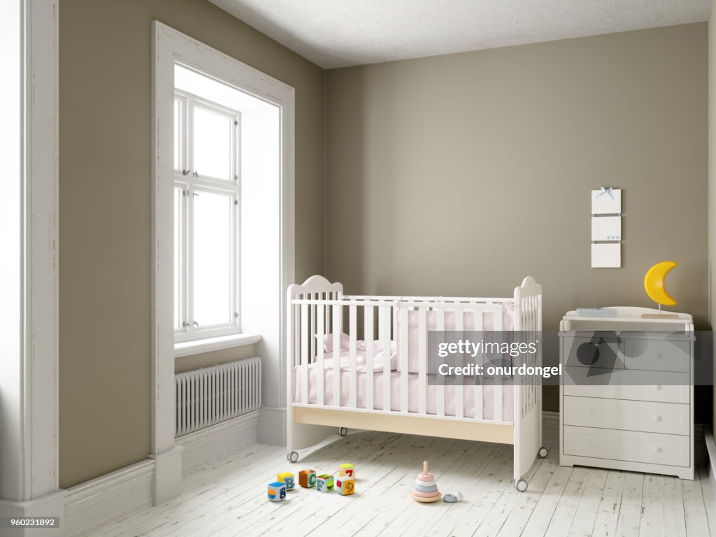 Modern nursery room with blank frame