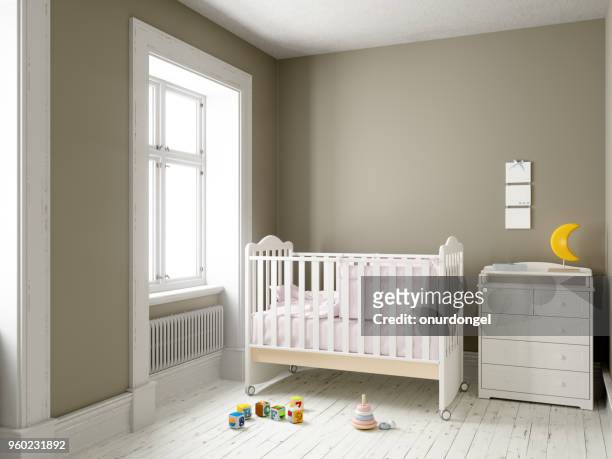 modern nursery room with blank frame - empty crib imagens e fotografias de stock