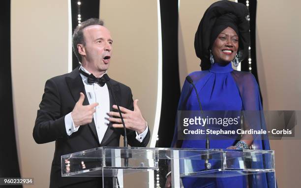 Italian actor Roberto Benigni and Khadja Nin on stage during the Closing Ceremony at the 71st annual Cannes Film Festival at Palais des Festivals on...