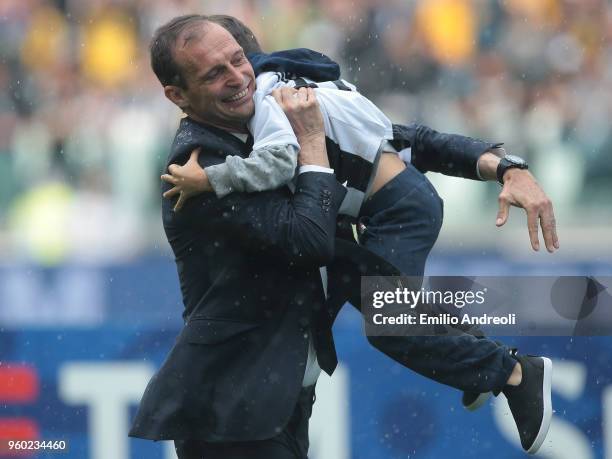 Juventus FC coach Massimiliano Allegri celebrates with his son after winning the Serie A Championship at the end of the serie A match between...