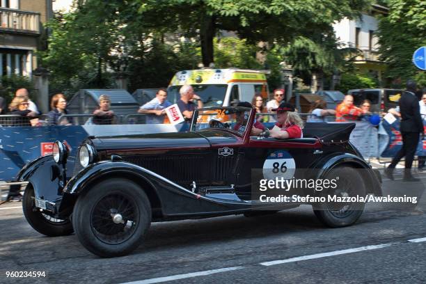 An Alfa Romeo TIPO 6C 1750 GRAN SPORT CASTAGNA passes through the city center of Brescia during the last day of the 1000 Miles Historic Road Race...