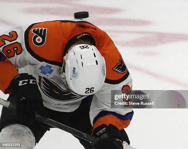 Lehigh Valley Phantoms center Phil Varone narrowly ducks as a puck whistles over his head as the Toronto Marlies beat the Lehigh Valley Phantoms 4-3...