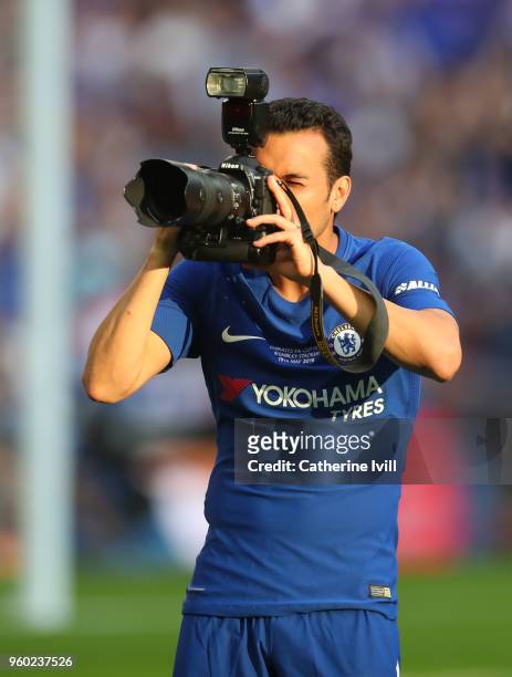 Pedro of Chelsea takes a photo with a camera after The Emirates FA Cup Final between Chelsea and Manchester United at Wembley Stadium on May 19, 2018...