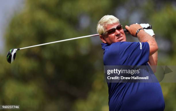 John Daly of the United States plays his tee shot on the 13th hole during the third round of the Regions Tradition at Greystone Golf & Country Club...