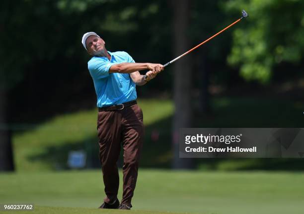 Rocco Mediate of the United States plays a shot on the 18th hole during the third round of the Regions Tradition at Greystone Golf & Country Club on...