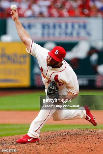 Greg Holland of the St. Louis Cardinals delivers a pitch against the Philadelphia Phillies in the eighth inning at Busch Stadium on May 19, 2018 in...