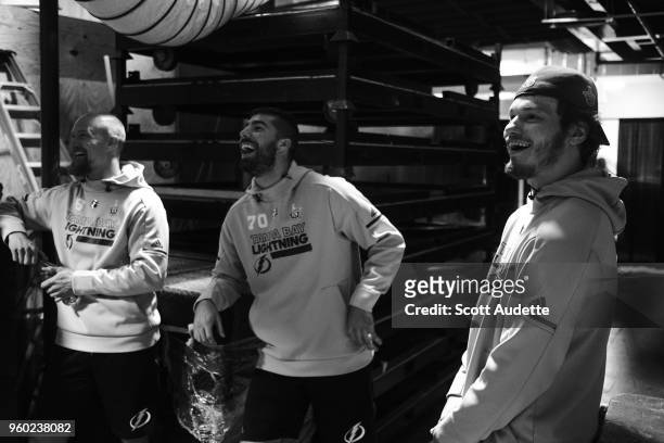 Anton Stralman, Louis Domingue, Mikhail Sergachev of the Tampa Bay Lightning play basketball before the game against the Washington Capitals during...