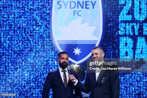 Simon Hill speaks with Alex Brosque during the Sydney FC Sky Ball at The Star on May 19, 2018 in Sydney, Australia.