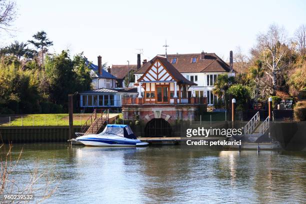 houses along the river thames - kingston upon thames stock pictures, royalty-free photos & images