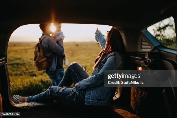 happy family on road trip - road trip van stock pictures, royalty-free photos & images