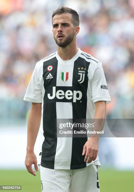 Miralem Pjanic of Juventus FC looks on during the serie A match between Juventus and Hellas Verona FC at Allianz Stadium on May 19, 2018 in Turin,...