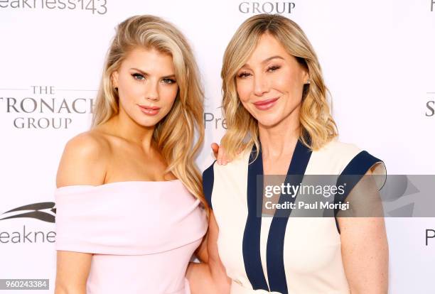 Model Charlotte McKinney and Chairman and CEO of The Stronach Group Belinda Stronach attend The Stronach Group Chalet at 143rd Preakness Stakes on...