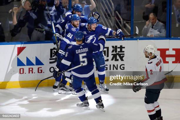 Ondrej Palat of the Tampa Bay Lightning celebrates with his teammates Victor Hedman, Steven Stamkos, and Dan Girardi after scoring a goal on Braden...