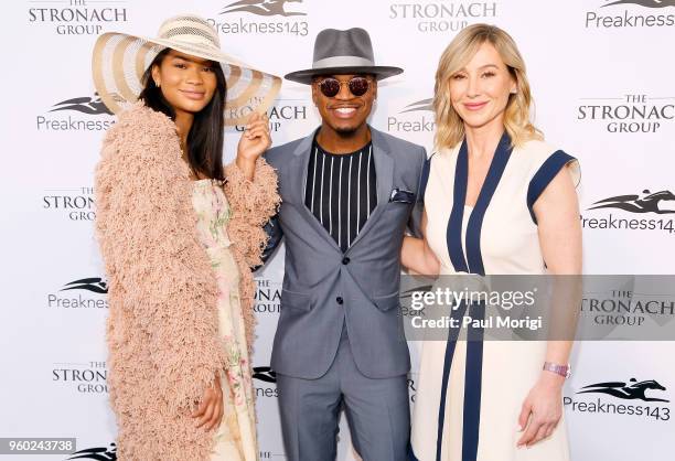 Model Chanel Iman, singer-songwriter Ne-Yo and Chairman and CEO of The Stronach Group Belinda Stronach attend The Stronach Group Chalet at 143rd...