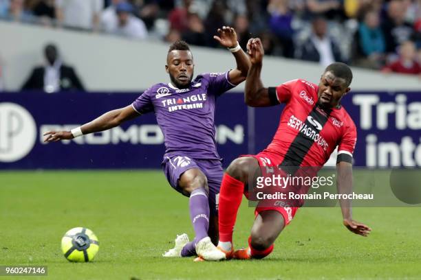 Steeve Yago of Toulouse and Marcus Thuram of Guingamp battle for the ball during the Ligue 1 match between Toulouse and EA Guingamp at Stadium...