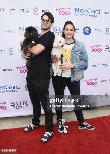 Television personalities Tom Schwartz and Katie Maloney and their dogs Gordo and Butter attend the Lisa Vanderpump and The Vanderpump Dog...