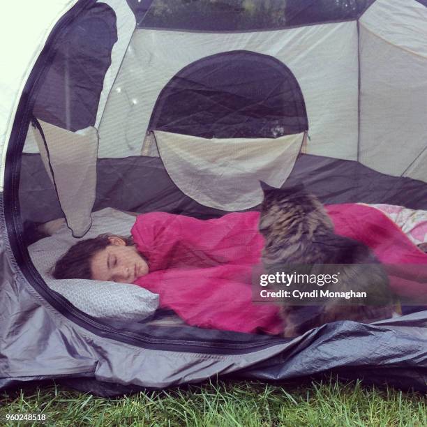 Little Girl Camping out with Cat