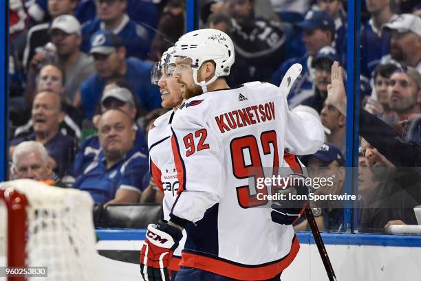 Washington Capitals center Evgeny Kuznetsov celebrates his goal with Washington Capitals right wing T.J. Oshie during the second period of the fifth...