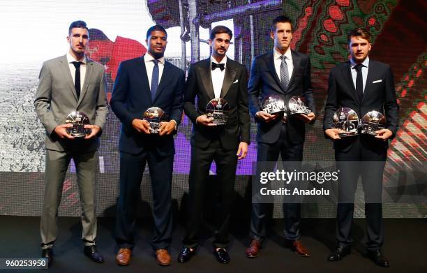 Award winners for 'season's best players' Luka Doncic , Jan Vesely , Alexey Shved , Kyle Hines and Nando De Colo pose for a photo after 2017-18...