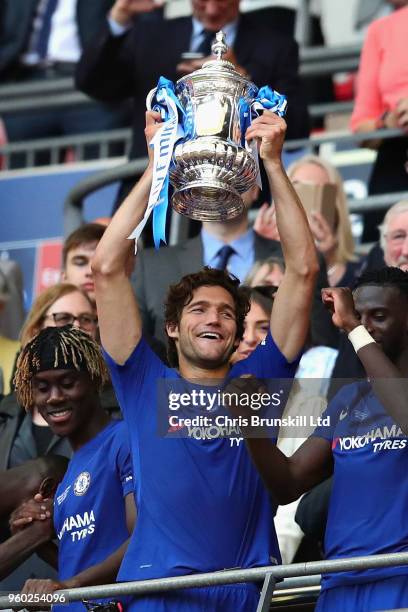 Marcos Alonso of Chelsea lifts the FA Cup trophy after his side won during the Emirates FA Cup Final between Chelsea and Manchester United at Wembley...