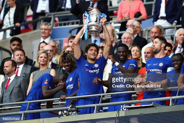 Marcos Alonso of Chelsea lifts the FA Cup trophy after his side won during the Emirates FA Cup Final between Chelsea and Manchester United at Wembley...