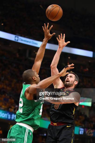 Kevin Love of the Cleveland Cavaliers shoots the ball against Al Horford of the Boston Celtics in the first half during Game Three of the 2018 NBA...