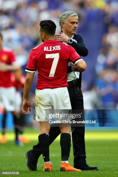 Manager of Manchester United Jose Mourinho hugs Alexis Sanchez of Manchester United after the Emirates FA Cup Final between Chelsea and Manchester...
