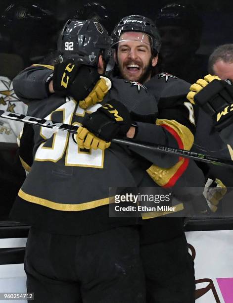 Tomas Nosek of the Vegas Golden Knights is congratulated by teammate Colin Miller after scoring a second-period goal against the Winnipeg Jets in...