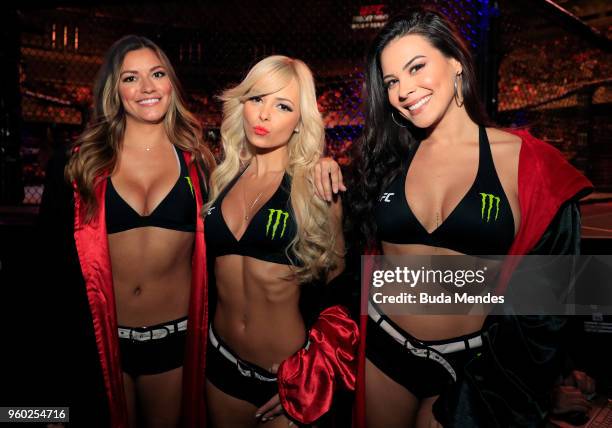 Octagon Girls Vanessa Hanson, Jhenny Andrade, and Camila Rodrigues de Oliveira pose for a photo during the UFC Fight Night event at Movistar Arena on...