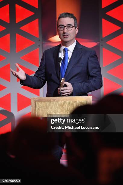 Comedian John Oliver of Last Week Tonight with John Oliver accepts Peabody award onstage during The 77th Annual Peabody Awards Ceremony at Cipriani...