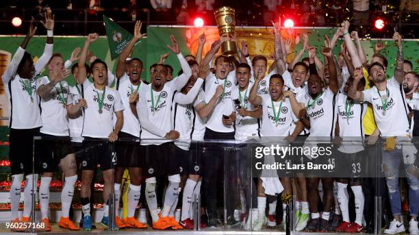 Alexander Meier of Frankfurt lifts the trophy after winning the DFB Cup final between Bayern Muenchen and Eintracht Frankfurt at Olympiastadion on...