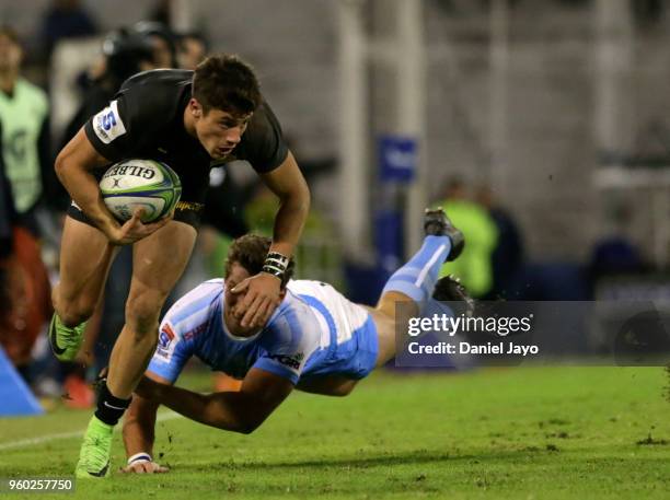 Bautista Delguy of Jaguares is tackled by John Jackson of Bulls during a match between Jaguares and Bulls as part of Super Rugby 2018 at Estadio Jose...