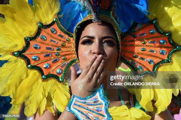 Dancer takes part in the International Carnival of Friendship in La Ceiba, Honduran Caribbean, on May 19, 2018.