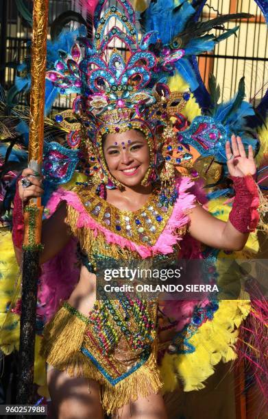 Dancer takes part in the International Carnival of Friendship in La Ceiba, Honduran Caribbean, on May 19, 2018.