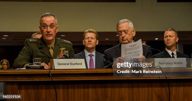 View of, from fore left, American military commander and Chariman of the Joint Chiefs of Staff General Joseph Dunford and Secretary of Defense Jim...