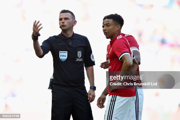 Referee Michael Oliver gestures during the Emirates FA Cup Final between Chelsea and Manchester United at Wembley Stadium on May 19, 2018 in London,...