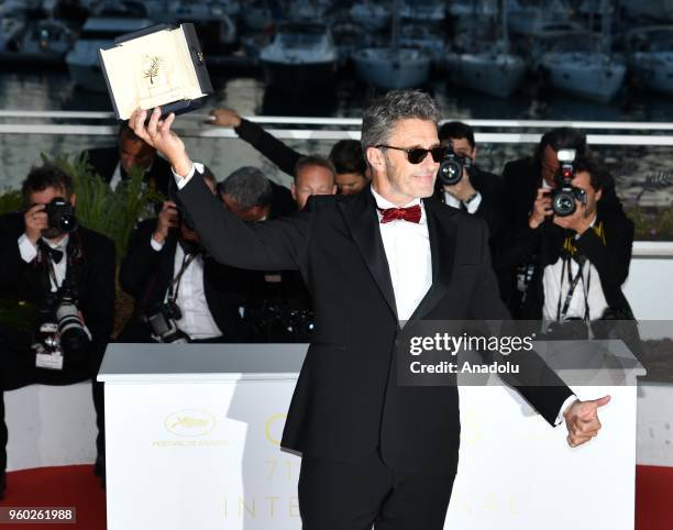 Polish director Pawel Pawlikowski poses with his Best Director Prize for the film 'Cold War' at the 71st annual Cannes Film Festival in Cannes,...