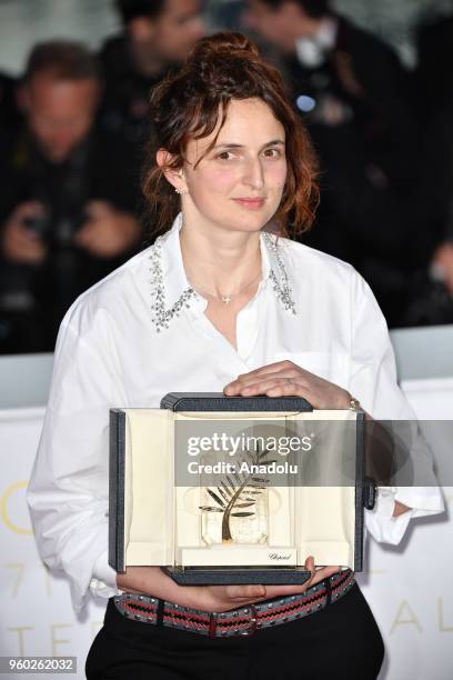 Italian director Alice Rohrwacher poses during the Award Winners photocall after she won Best Screenplay Prize for Lazzaro Felice at the 71st Cannes...
