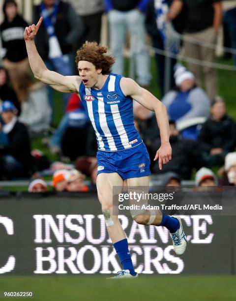 Ben Brown of the Kangaroos celebrates a goal during the 2018 AFL round nine match between the North Melbourne Kangaroos and the GWS Giants at...