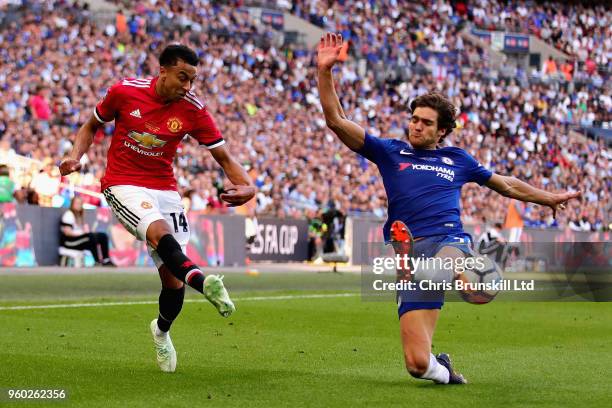 Jesse Lingard of Manchester United and Marcos Alonso of Chelsea in action during the Emirates FA Cup Final between Chelsea and Manchester United at...