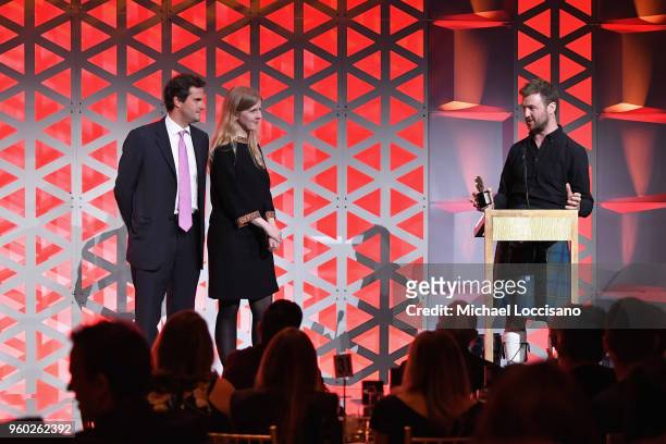 Director and Producer Mike Day, Director and Producer Justine Nagan and Producer Chris White of The Islands and The Whale accept a Peabody onstage...