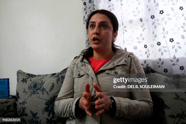 Abir Khaled, a monitor at the "Hori" rehabilitation centre for former Islamic State group child fighters run by Kurds in Tal Maarouf, in Syria's...