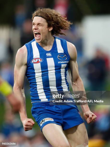 Ben Brown of the Kangaroos celebrates a goal during the 2018 AFL round nine match between the North Melbourne Kangaroos and the GWS Giants at...