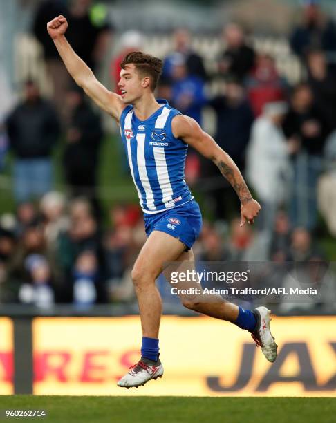 Jy Simpkin of the Kangaroos celebrates a goal during the 2018 AFL round nine match between the North Melbourne Kangaroos and the GWS Giants at...