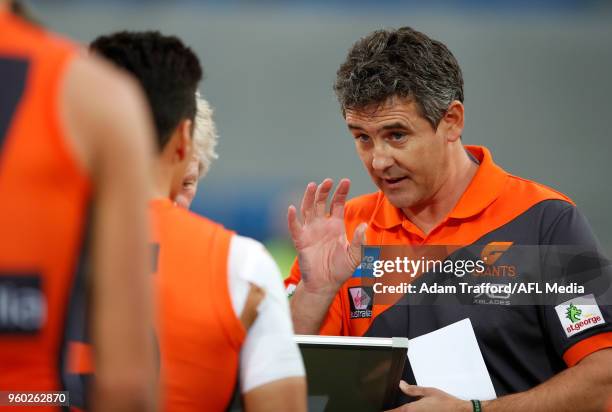 Leon Cameron, Senior Coach of the Giants addresses his players during the 2018 AFL round nine match between the North Melbourne Kangaroos and the GWS...