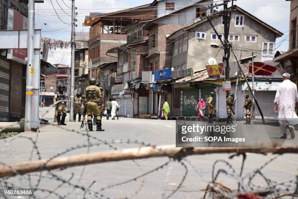 Indian forces stand alert during the curfew in many parts of Srinagar. Authorities imposed curfew in many parts of Srinagar to prevent lal chowk...